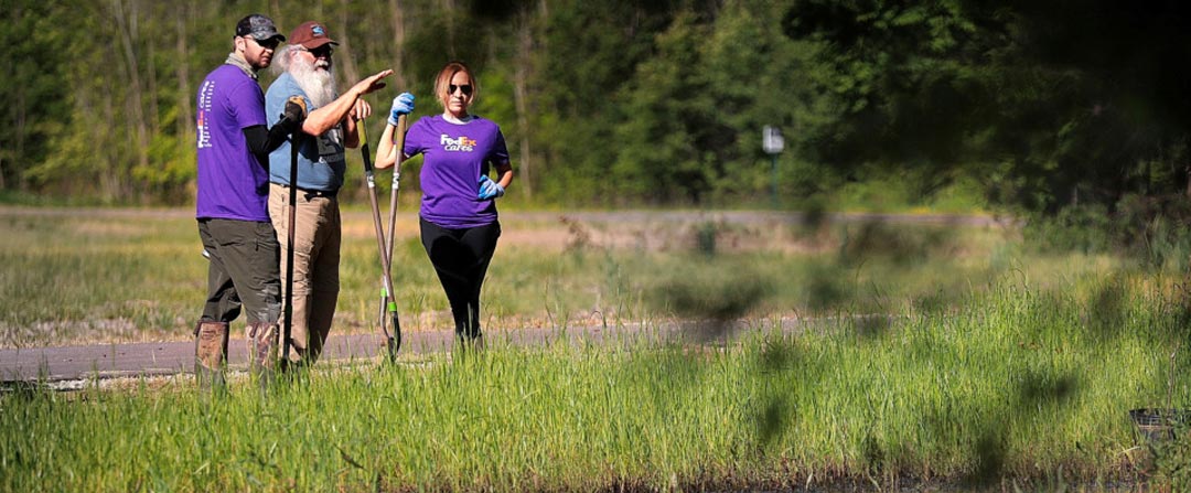 FedEx volunteers spruce up Wolf River Greenway’s newest section